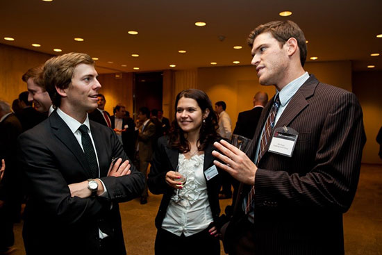 Members of the Cornell Real Estate Club at a social gathering